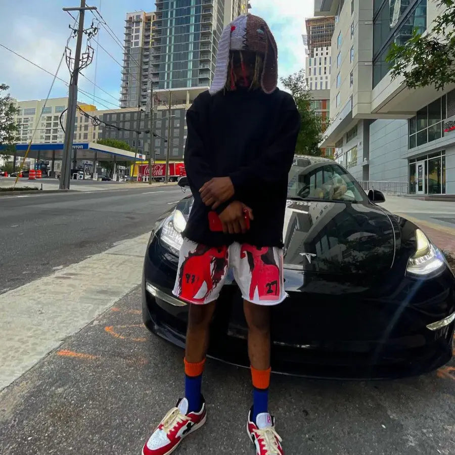 ÜNDR streetwear sighting beside a black car